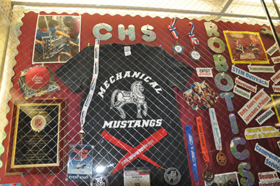 A display case devoted to the Mechanical Mustangs robotics team is prominent in Clifton High School.